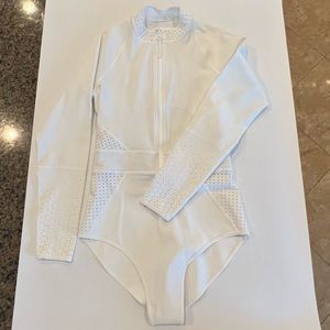 White surf one piece rash guard